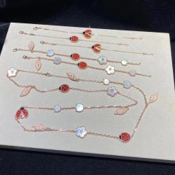 van-cleef-arpels-lucky-spring-long-necklace-15-motifs-rose-gold-carnelian-mother-of-pearl-onyx-vcarp7rt00