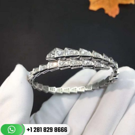REF . 351844 Serpenti one-coil slim bracelet in 18 kt white gold, set with full pavé diamonds.