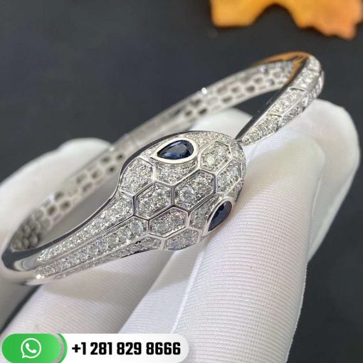 354098 Serpenti bracelet bracelet set with 18 carats of white gold, sapphire eyes (0.5 carats) and pavé diamonds (1.25 carats).