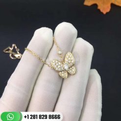 VCARO3M300 Two Butterfly pendant, yellow gold, round and marquise-cut diamonds; diamond quality DEF, IF to VVS.