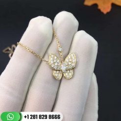 VCARO3M300 Two Butterfly pendant, yellow gold, round and marquise-cut diamonds; diamond quality DEF, IF to VVS.