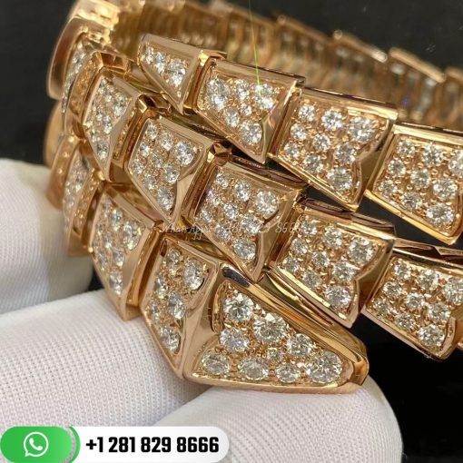 REF . 345203 Serpenti two-coil bracelet in 18 kt white gold, set with full pavé diamonds.