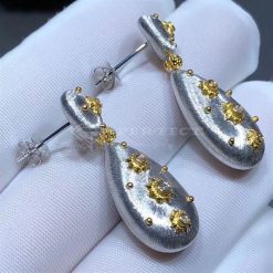 Buccellati Macri Pendant earrings in white gold with white gold bezels set with diamonds.