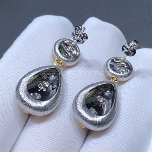 Buccellati Macri Pendant earrings in white gold with white gold bezels set with diamonds.