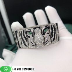panthere-de-cartier-tiger-bracelet-in-white-gold-with-diamonds-and-emeralds-eyes