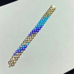 van-cleef-arpels-bouton-dor-bracelet-yellow-gold-turquoise-and-lapis-lazuli-vcaro6w400